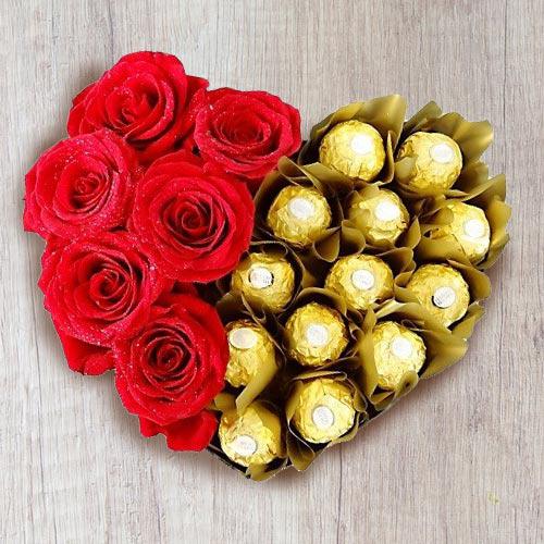 Online marvelous heart shaped arrangement of ferrero rocher with roses ...